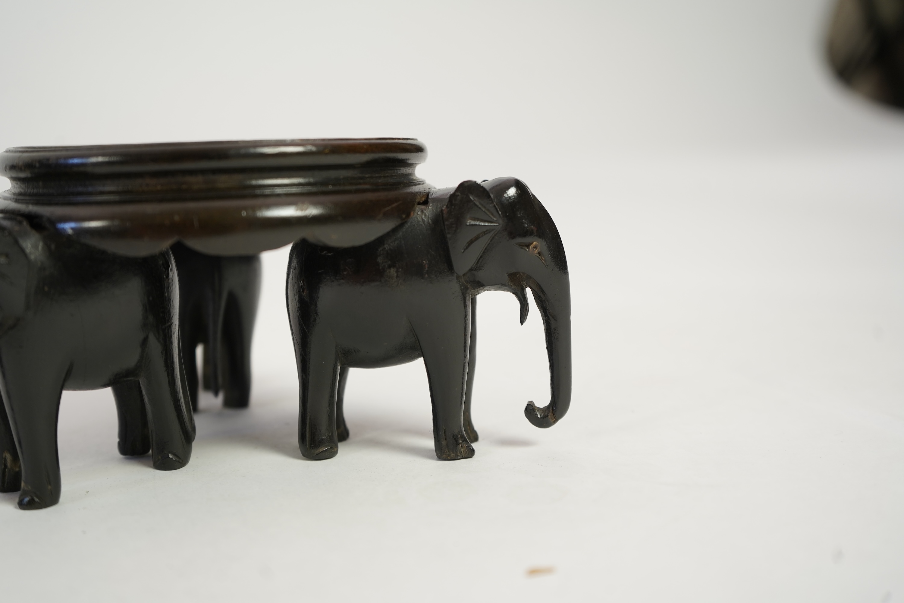 A group of sixteen Chinese hardwood stands together with a Japanese stand, 19th/20th century